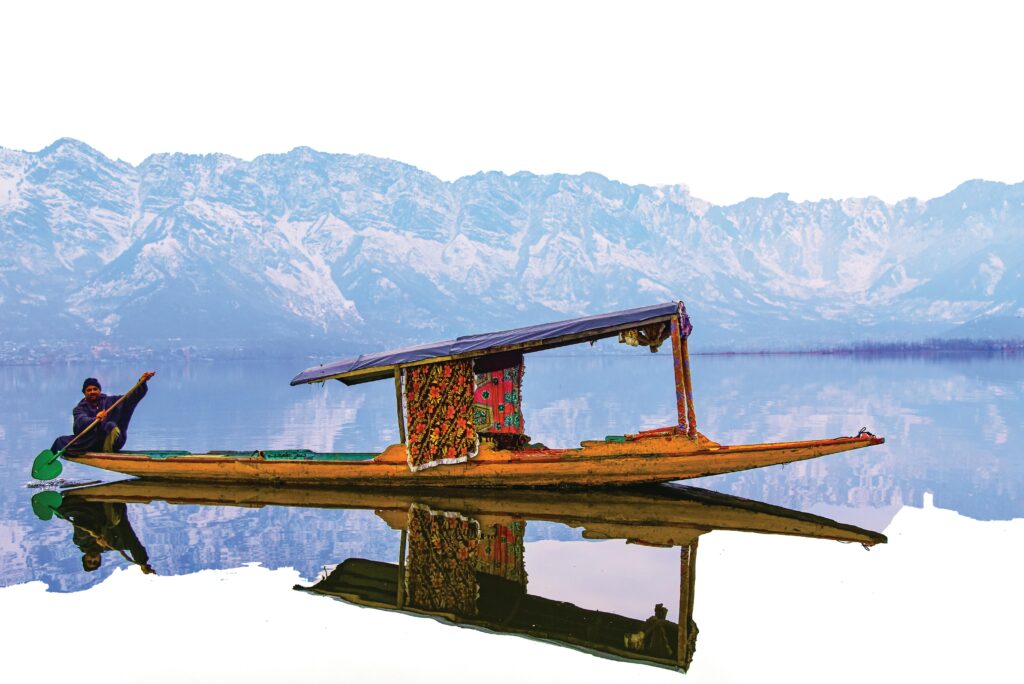 Man on Boat on Dal Lake in India